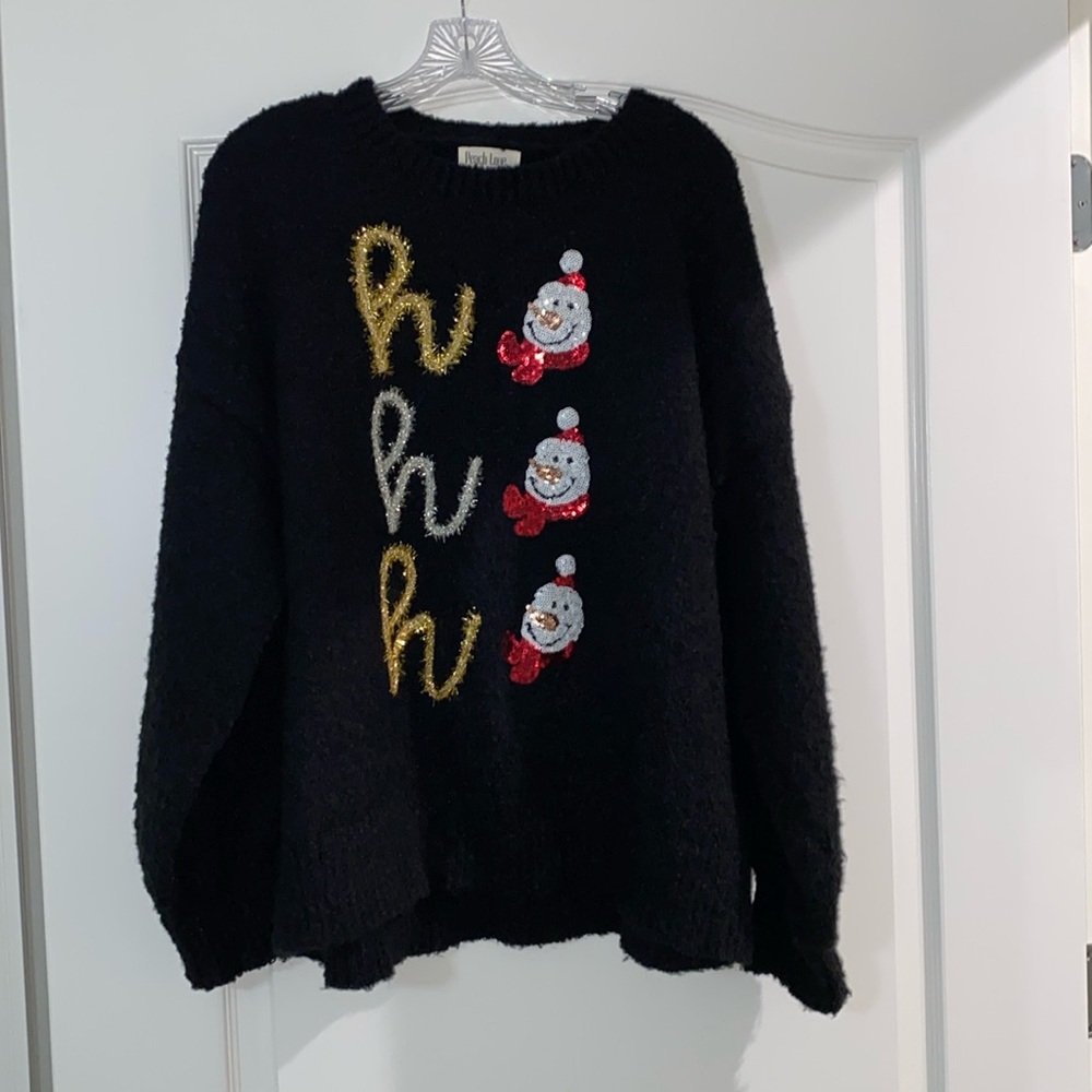Woman’s black long sleeve snowman sweater size L brand is Peach Love  new